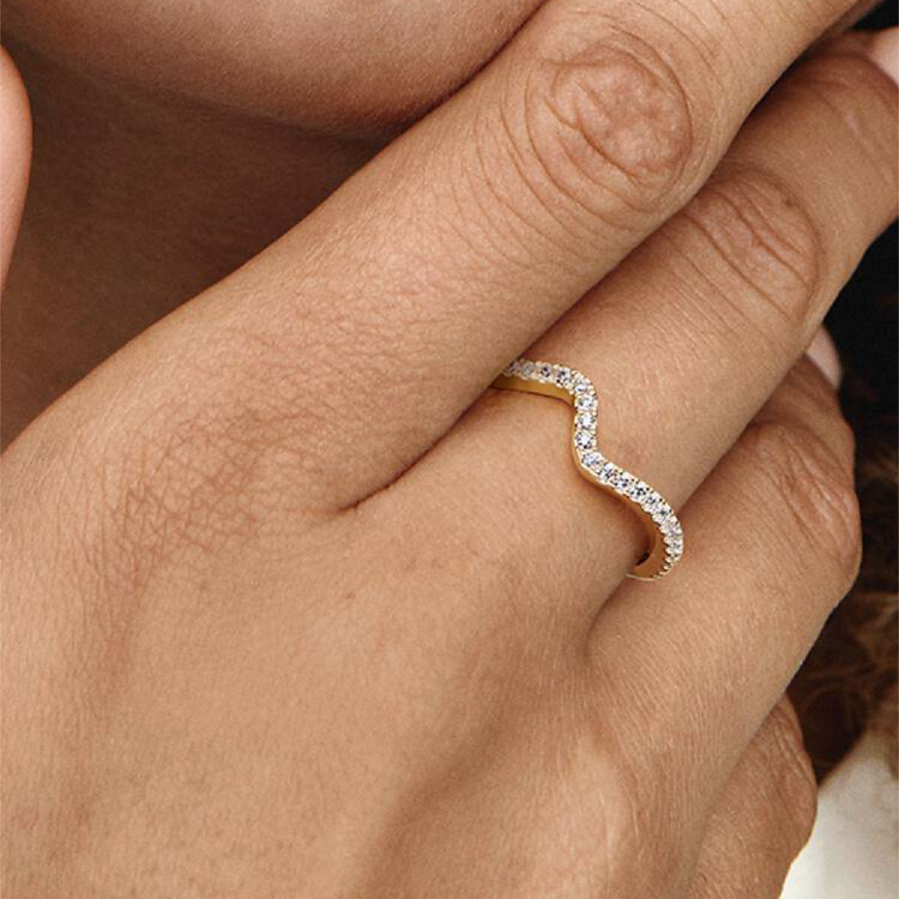 Anello Onda Pietre Luminose Dorato