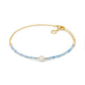 Comete Bracciale in Argento dorato con acquamarina e perla – BRA287